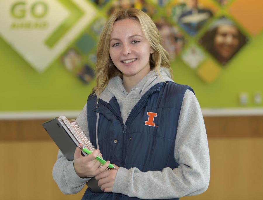 Smiling girl in UIUC vest at Parkland