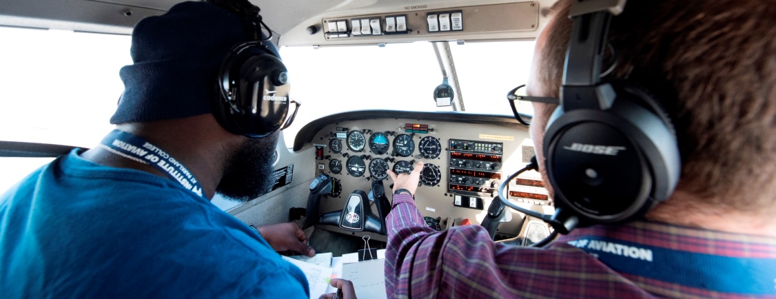 Instructor and student in cockpit