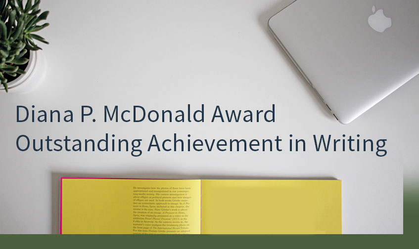 Award image of laptop and book Award image of laptop and book