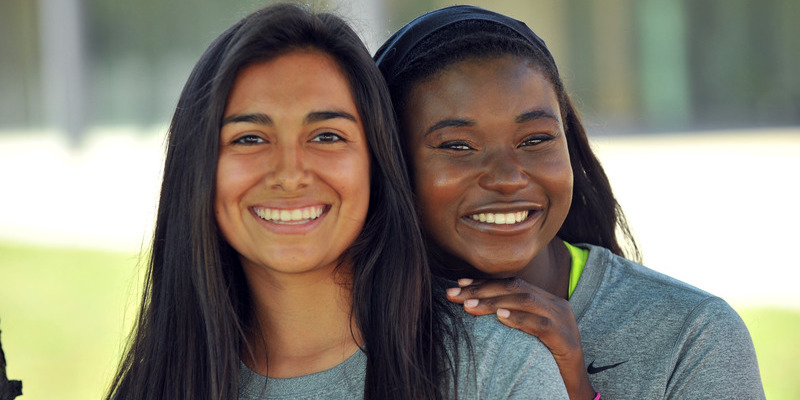 two smiling students